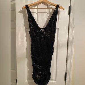 Urban Outfitters black sequined dress. New with tags.